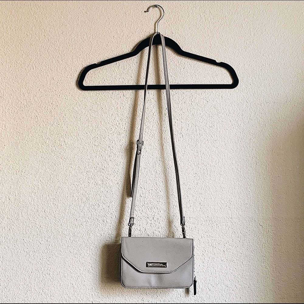Over the shoulder purse with detachable wallet.